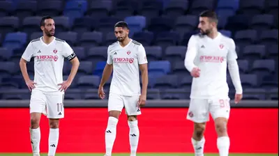 דן איינבינדר לצד בריאן פאסי הפועל תל אביב. מאור אלקסלסי