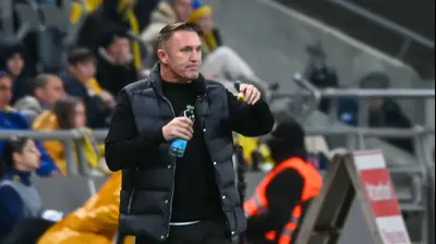 מאמן מכבי תל אביב רובי קין. ברני ארדוב