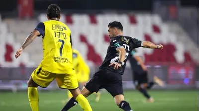 פרדי ורגאס מכבי בני ריינה לצד אבי ריקן הפועל פתח תקוה. מאור אלקסלסי