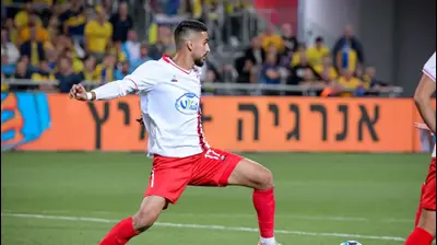 חסן חילו שחקן בני סכנין. אריאל שלום