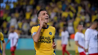 ערן זהבי שחקן מכבי תל אביב חוגג שער. אריאל שלום