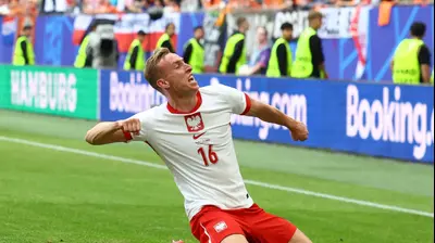 שחקן נבחרת פולין אדם בוקסה חוגג. רויטרס