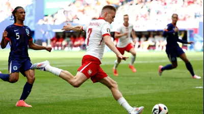 שחקן נבחרת פולין קרול שבידרסקי. ODD ANDERSEN/AFP,GettyImages