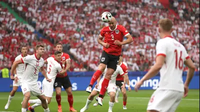 שחקן נבחרת אוסטריה, גרנוט טראונר, כובש מול פולין. Julian Finney,GettyImages