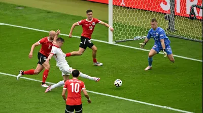 שחקן נבחרת פולין, קשישטוף פיונטק, כובש מול אוסטריה. Dan Mullan,GettyImages