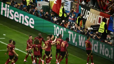 שחקני נבחרת בלגיה חוגגים. ANGELOS TZORTZINIS/AFP,GettyImages