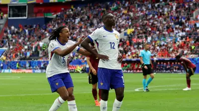 שחקני נבחרת צרפת, רנדל קולו מואני, ז'ול קונדה. Carl Recine,GettyImages