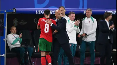 מאמן נבחרת פורטוגל, רוברטו מרטינס, עם ברונו פרננדש. Stu Forster,GettyImages