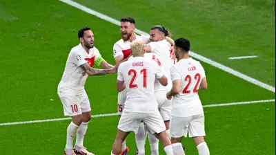 שחקני נבחרת טורקיה חוגגים. רויטרס