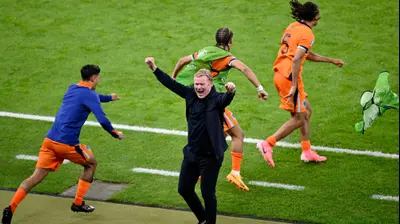 רונאלד קומאן מאמן נבחרת הולנד חוגג. רויטרס