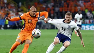 דונייל מאלן נבחרת הולנד לצד קירן טריפייר נבחרת אנגליה. GettyImages