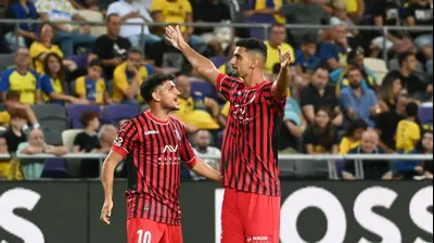 יונתן ליש (מימין) עם עידן דהן שחקני הפועל ירושלים. ברני ארדוב