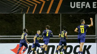 שחקני מכבי תל אביב חוגגים. רויטרס