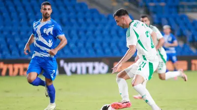 דין דוד שחקן מכבי חיפה. קובי אליהו