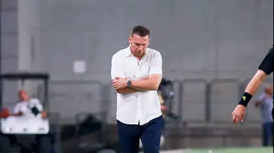 ברק בכר מאמן מכבי חיפה. קובי אליהו