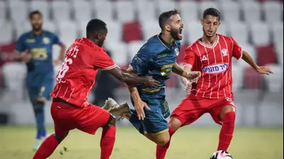 שחקן בני ריינה גיא חדידה מול שחקן בני סכנין נפתלי בלאי. מאור אלקסלסי