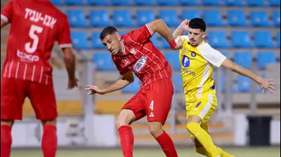 דור תורג'מן מכבי תל אביב לצד קונסטנטינוס סוטיריו בני סכנין. מאור אלקסלסי