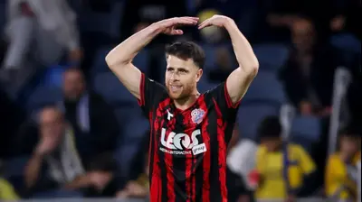 גיא מלמד הפועל חיפה חוגג. מאור אלקסלסי