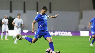 אנאס מחאמיד שחקן מכבי פתח תקוה. קובי אליהו