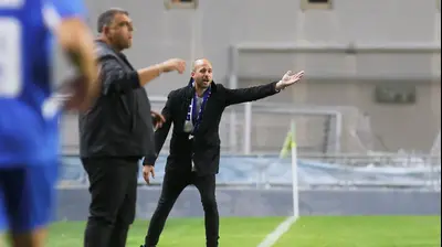 תמיר לוזון מאמן מכבי פתח תקוה. קובי אליהו