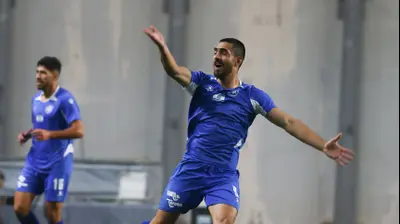 שחקן מכבי פתח תקוה, אנאס מחאמיד. דני מרון