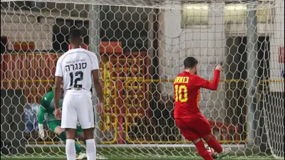 מוחמד כנעאן, שחקן מ.ס. אשדוד. לירון מולדובן 