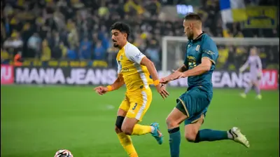 רוי רביבו, מכבי תל אביב לצד נמניה ליוביסלייביץ', מכבי בני ריינה. אריאל שלום