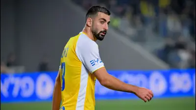 הישאם לאיוס, מכבי תל אביב. אריאל שלום