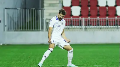 שחקן מכבי פתח תקוה ויטאלי דמשקאן. קובי אליהו