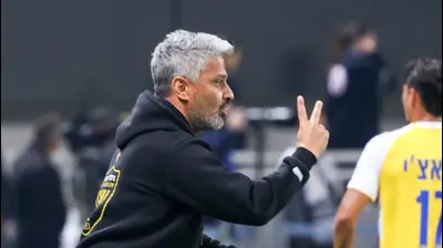 מאמן מכבי תל אביב ברק יצחקי. דני מרון