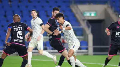 רוי רביבו שחקן מכבי תל אביב. קובי אליהו