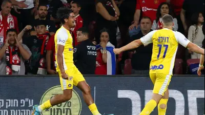 דור פרץ שחקן מכבי תל אביב. דני מרון