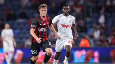 קינגס קאנגווה שחקן הפועל באר שבע מול איתמר נוי שחקן הפועל חיפה. מאור אלקסלסי