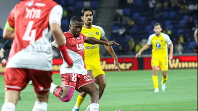 דראמן סאלו שחקן הפועל חיפה לפני דור פרץ שחקן מכבי תל אביב. לילך וייס רוזנברג