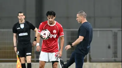 רן קוז'וך, מאמן הפועל באר שבע לצד גיא מזרחי. ברני ארדוב