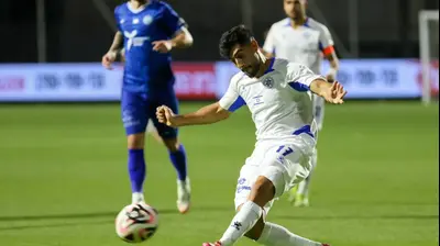 שחקן מכבי פתח תקוה, אביב סלם. קובי אליהו