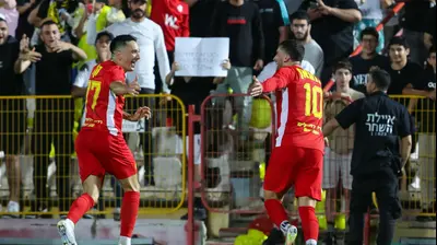 מוחמד כנעאן, ישראל קול שחקני מ.ס. אשדוד חוגגים. לירון מולדובן 