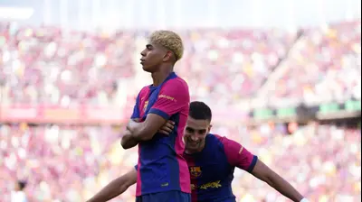 לאמין ימאל שחקן ברצלונה חוגג שער. Alex Caparros,GettyImages