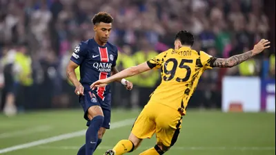 שחקן פריז סן ז'רמן, דזירה דואה, מול שחקן אינטר, אלסנדרו באסטוני. Justin Setterfield,GettyImages