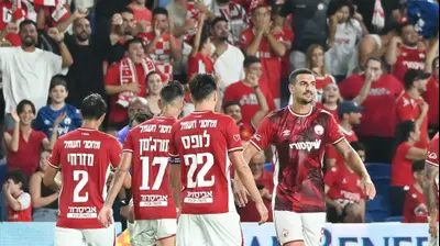 אור בלוריאן ושחקני הפועל באר שבע. ברני ארדוב