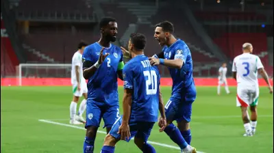 אלי דסה ושחקני נבחרת ישראל חוגגים. רויטרס