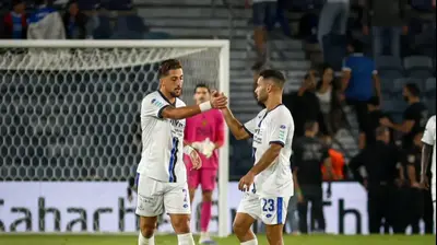 שביט מזל שחקן הפועל פתח תקוה (משמאל) חוגג עם דרור ניר. קובי אליהו