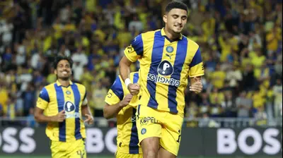 אלעד מדמון שחקן מכבי תל אביב חוגג שער. דני מרון