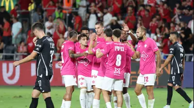 שחקני הפועל תל אביב חוגגים. דני מרון