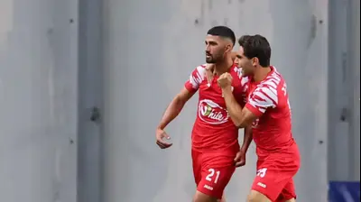 ג'ובייר בושנאק שחקן בני סכנין חוגג שער (משמאל), איתו עומר אבוהב. אודי ציטיאט