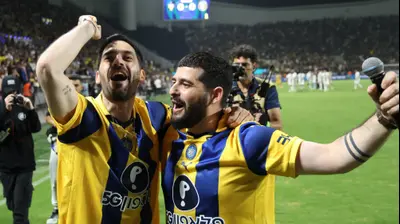 גלי וזיו ברמן, אוהדי מכבי תל אביב. דני מרון