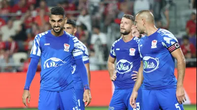 איאד אבו עביד (מימין), חסן חילו שחקני בני סכנין. דני מרון