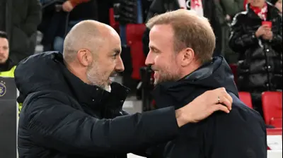 סבסטיאן הנס מאמן שטוטגרט עם ז'ארקו לאזטיץ' מאמן מכבי תל אביב. THOMAS KIENZLE/AFP,GettyImages