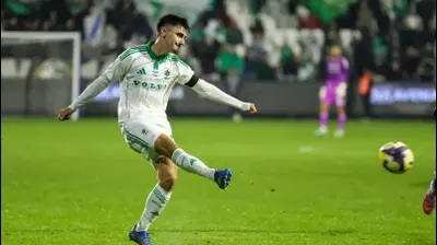 ילה בטאי שחקן מכבי חיפה. קובי אליהו