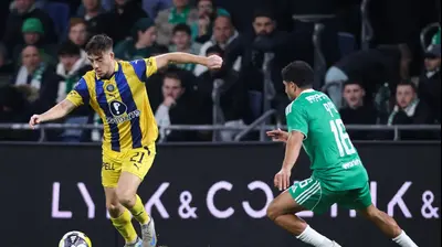 נועם בן הרוש שחקן מכבי תל אביב מול קני סייף שחקן מכבי חיפה. מאור אלקסלסי